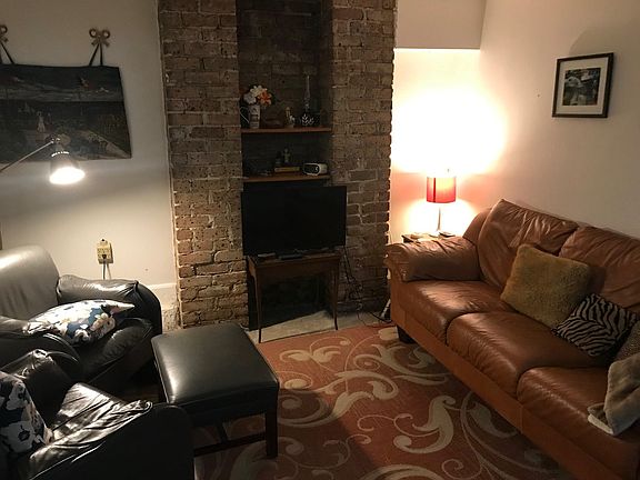 Furnished Living Room. Coat closet not pictured.