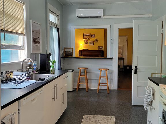 Kitchen, door leads to bathroom
