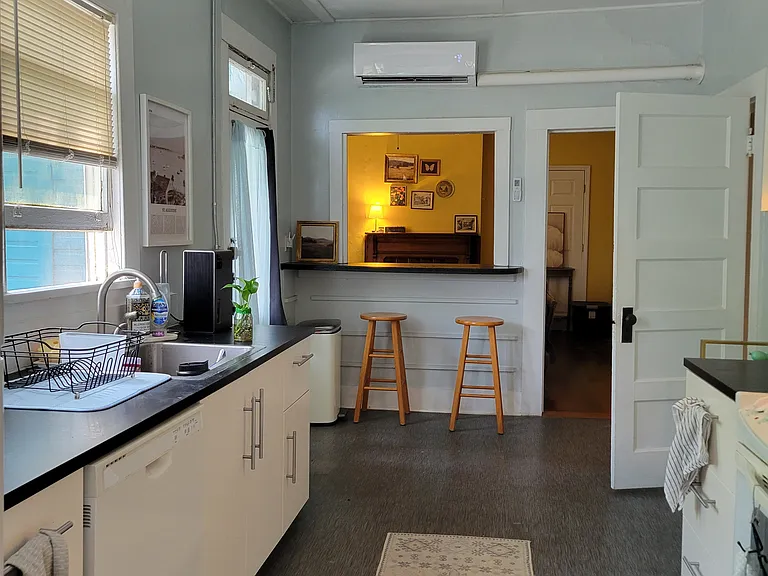 Kitchen, door leads to bathroom