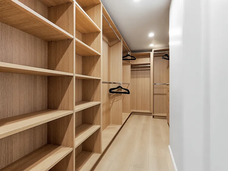 Primary bedroom features a covered balcony, fireplace, large spa bathroom, and incredibly spacious walk-in closet.