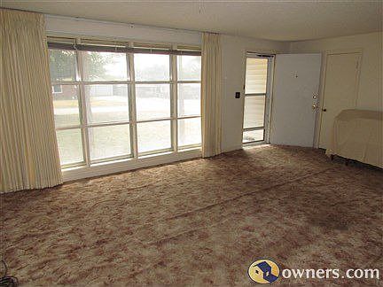 Hardwood floors under all carpeted in main house