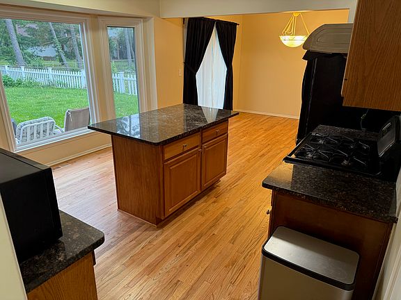 Updated kitchen with view to adjoining dinning room.
