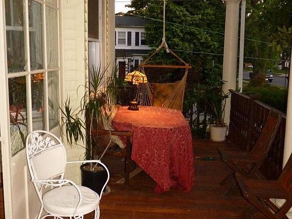 Open Porch with enclosure ovelooks serene neighborhood