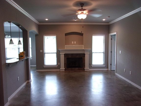 Living room with gas log fireplace.