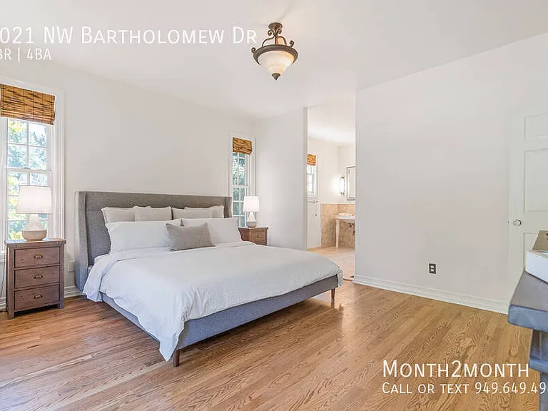 9021 NW Bartholomew Dr — Photo 23
