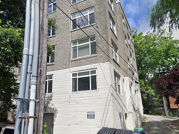 SE corner of building taken from alley