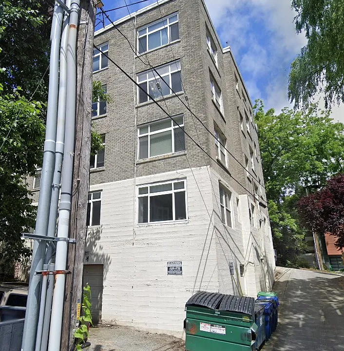 SE corner of building taken from alley