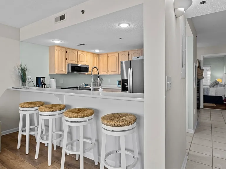 Barstool area in living/dining room...other side of the kitchen.