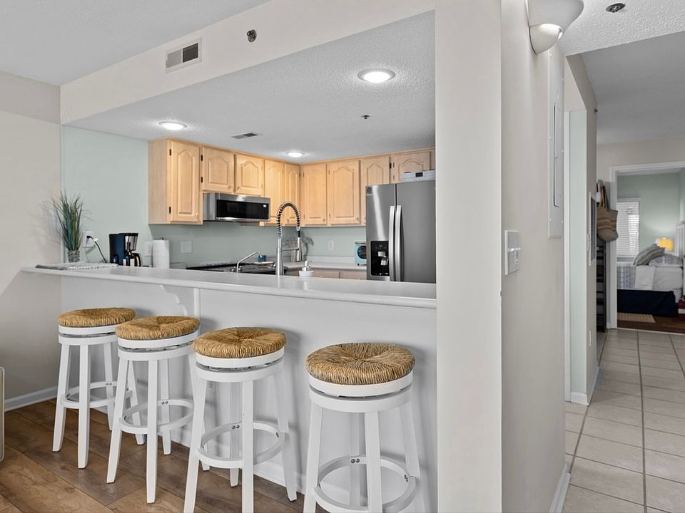 Barstool area in living/dining room...other side of the kitchen.
