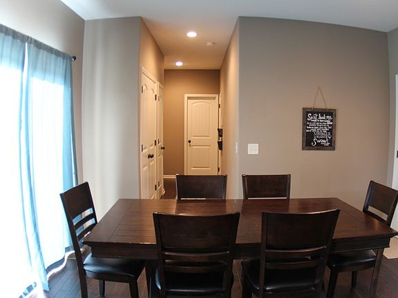 Open floor plan with dining off the kitchen, large pantry