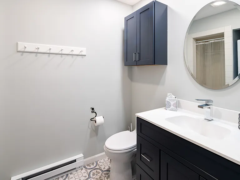 Downstairs bathroom with shower.