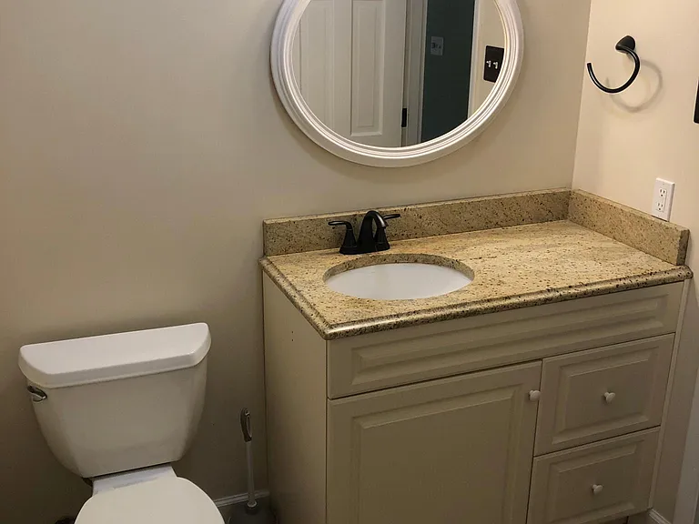 Hall bath; not shown is shower with half-tub. Great for bathing children or dogs.