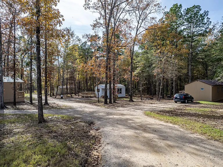 Grounds - looking southwest. These are your neighbors. This is what the grounds looks like. Right now we only have ONE pad site. Our other tenants live in cabins.