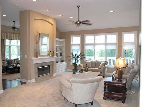 Open Floorplan w/lg GR shares Fireplace w/Hearth Rm. Lg windows w/water views.