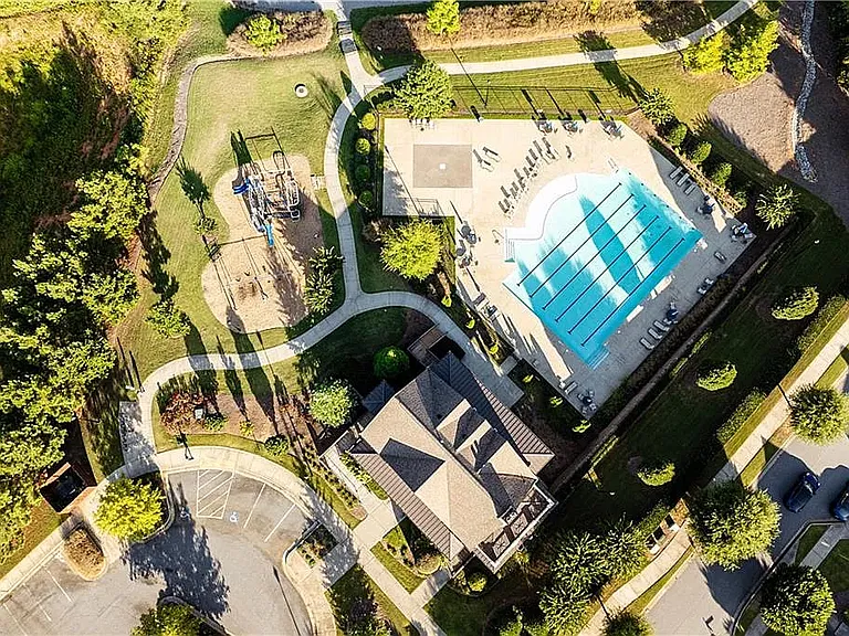 Kids play area, pool and clubhouse aerial shot