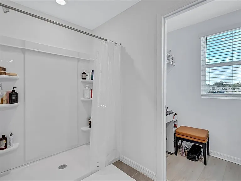 7601 Rosewood Garden Loop — Photo 32