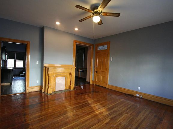 Living room with decorative mantel