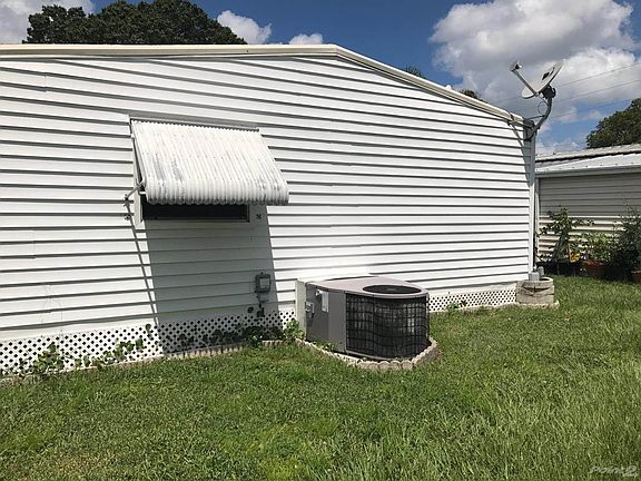 Back of home and central AC