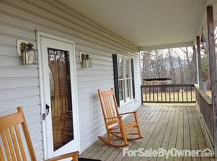 Front Porch
						:
						We enjoy our hammock and swing on the front porch. Read and enjoy the view