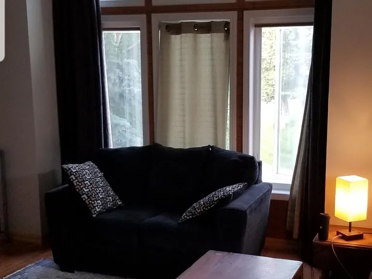 Living room. double curtains to block out bright sunlight in the evening during summer.