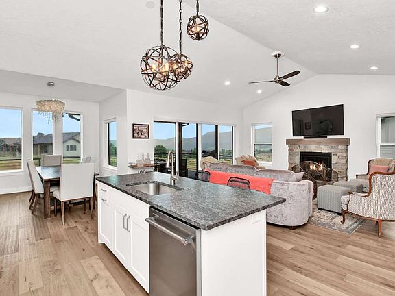 Living room with gas fireplace and smart 
tv