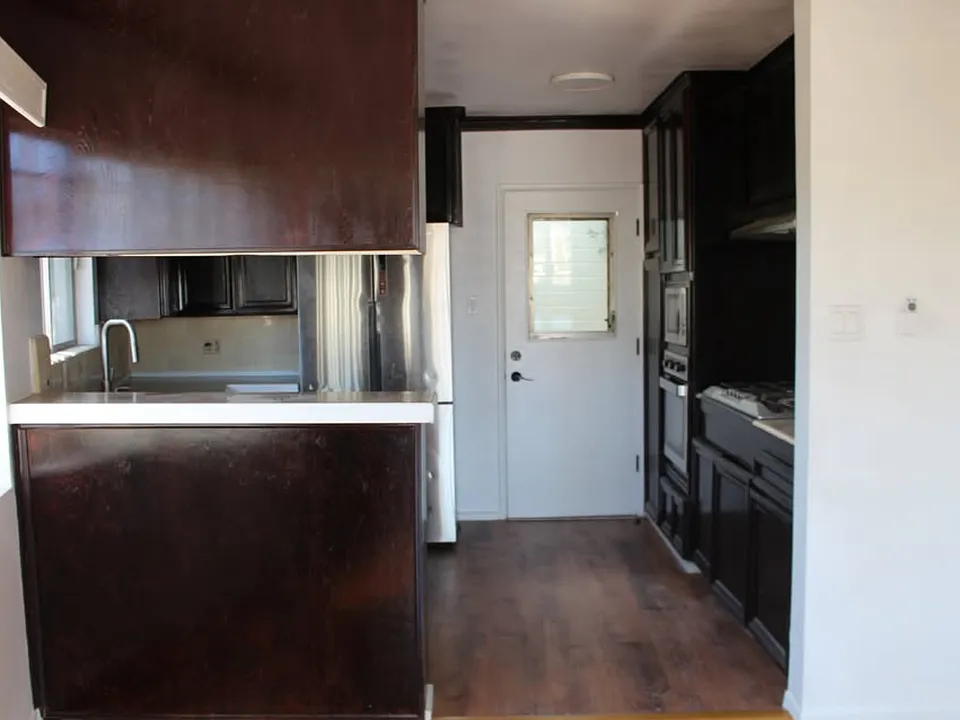 Kitchen with door to private patio