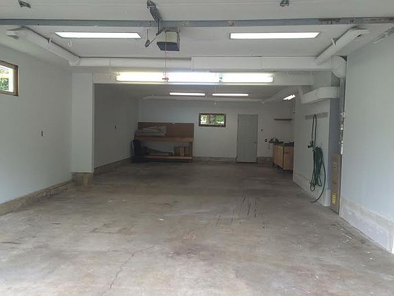 HUGE 4 car heated garage