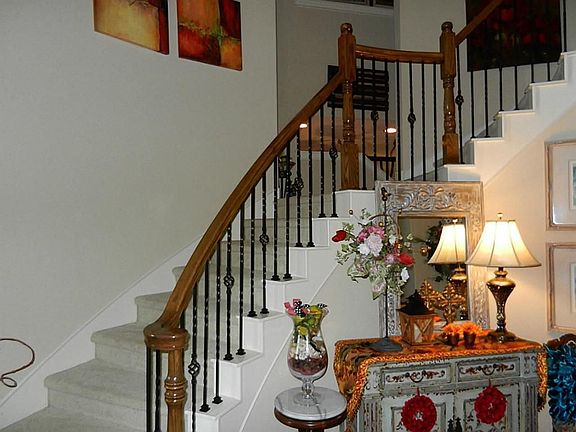 Beautiful foyer.  Double stairs from entry and kitchen.