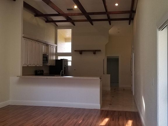 Large kitchen with beams