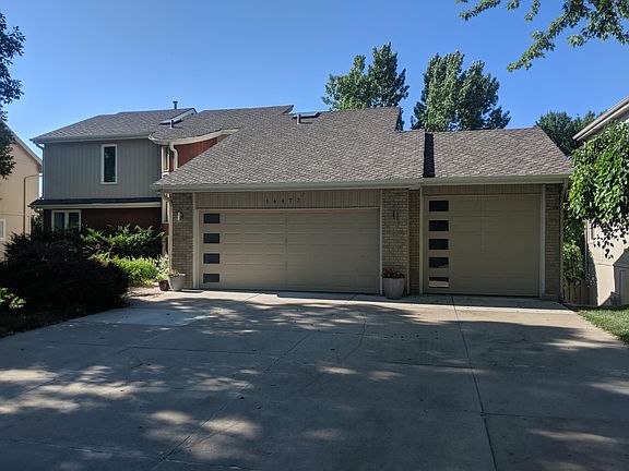 Three car garage, extra long and wide driveway