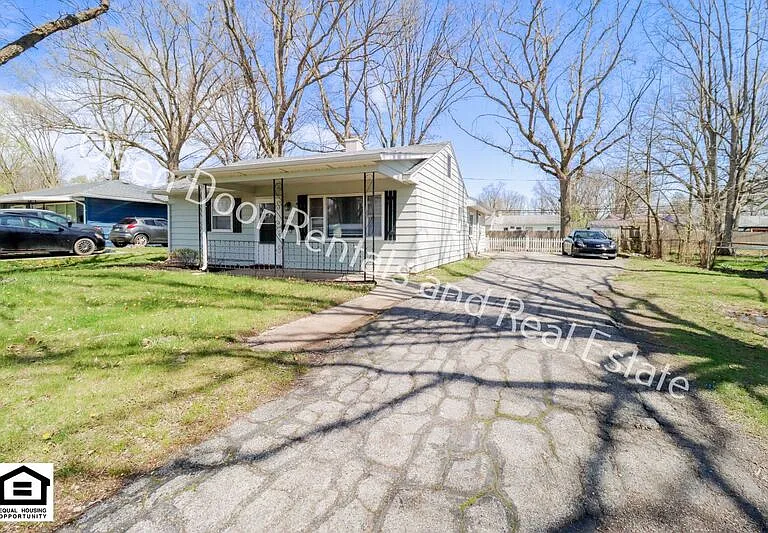 6033 S Calhoun St — Photo 1