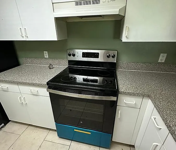 5005 Wiles Rd #102 — Photo 43