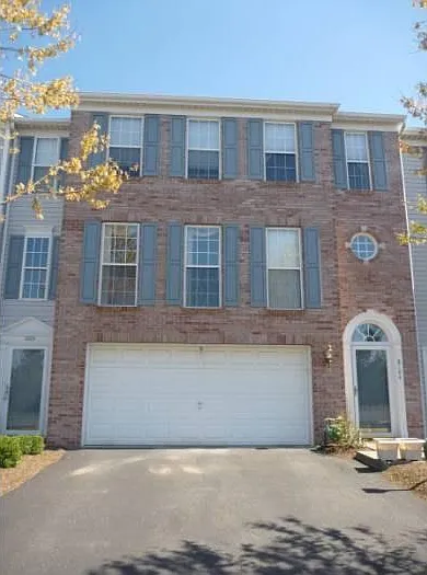 Front with 2 car garage