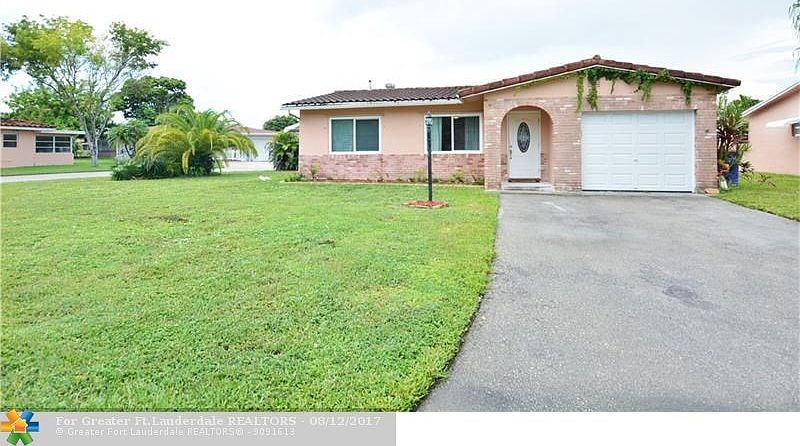 Large driveway, one car garage and spacious yard