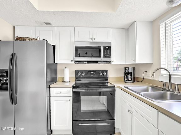 3rd image of 6654 BELL TOWER Court #7