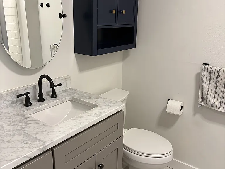 Bathroom with bathtub and shower