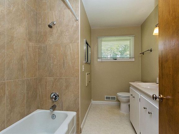 Bathroom (note laundry chute and large vanity for storage)