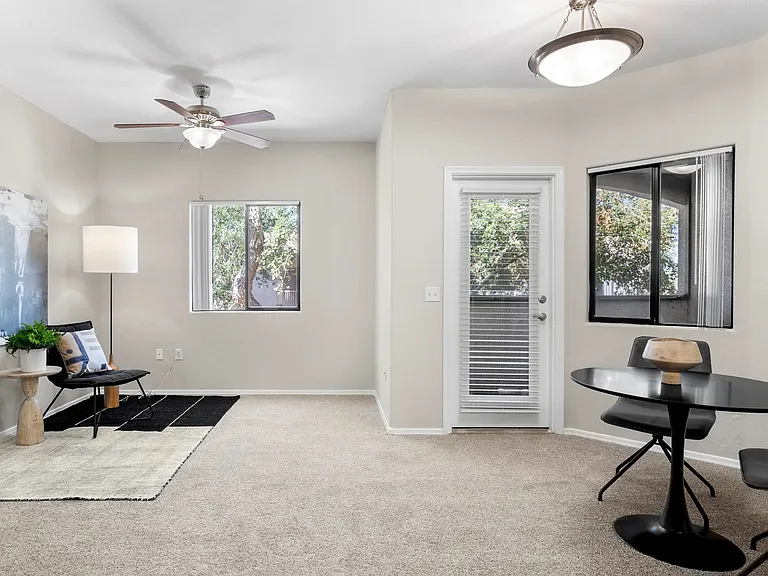 Find comfort in the spacious living room, bathed in natural light.