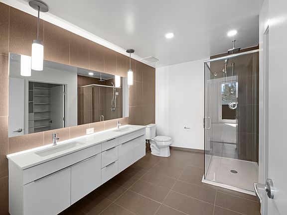 MasterBath #1 with Dual Sinks and Rain Shower Head and Large Walk In Closet