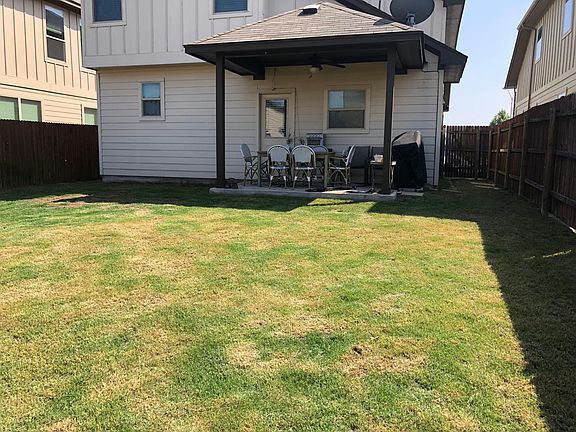 Large Patio in Back yard looking toward house
