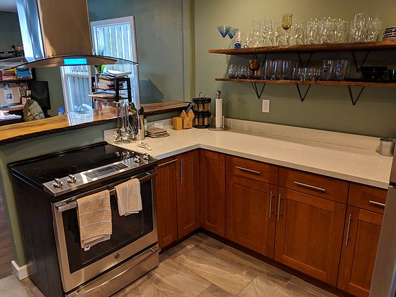 Good counter space and induction range over with modern hood.