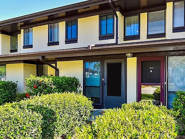 58 CLUB HOUSE DRIVE #104, PALM COAST, FL 32137