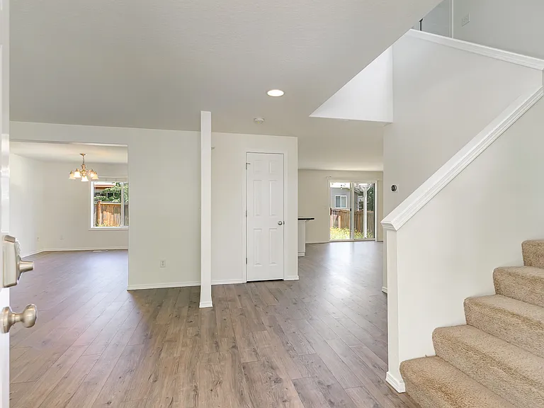 Stairs and view from the front door while entering the home