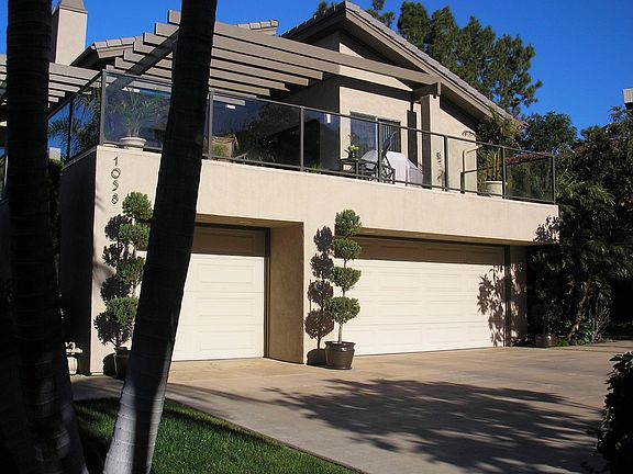 3 car garage-trellised deck with ocean view