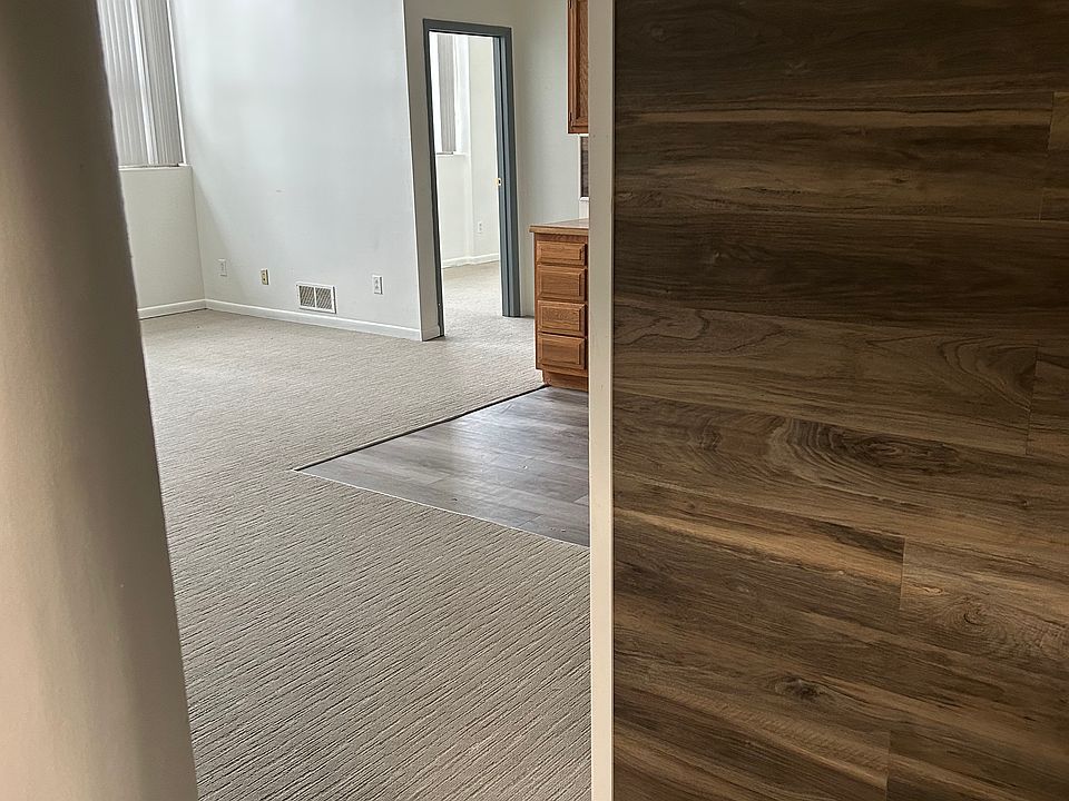 view from door into living room and kitchen