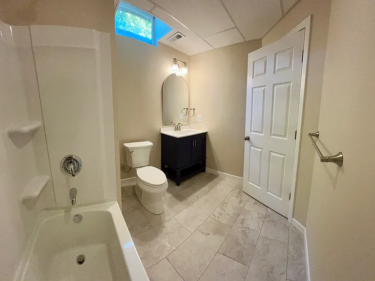 NEW Lower level full bath.
