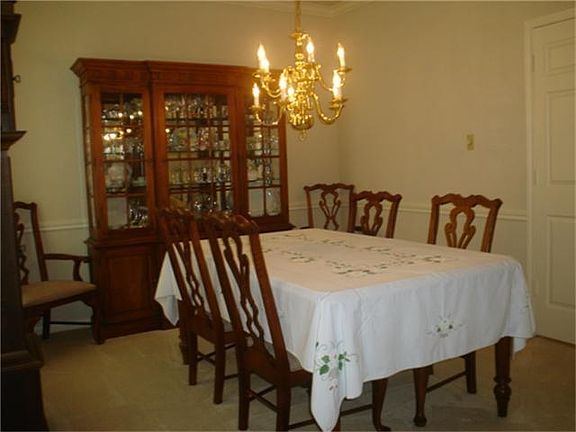 Double doors lead to the kitchen, so this is a perfect room for all the family dinners