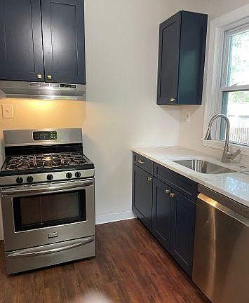 Brand new custom cabinets with stainless appliances.