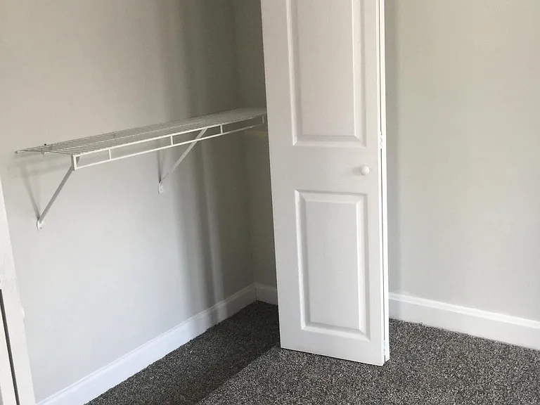 Master Bedroom off the kitchen on the right.