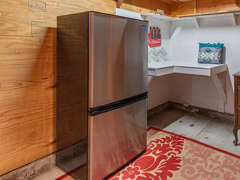 Bonus game room located in the detached garage (includes a ping pong table and extra full size refrigerator). Also a great place to store ski equipment during winter!